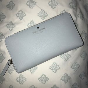 Super cute Kate Spade Wallet with back pocket!